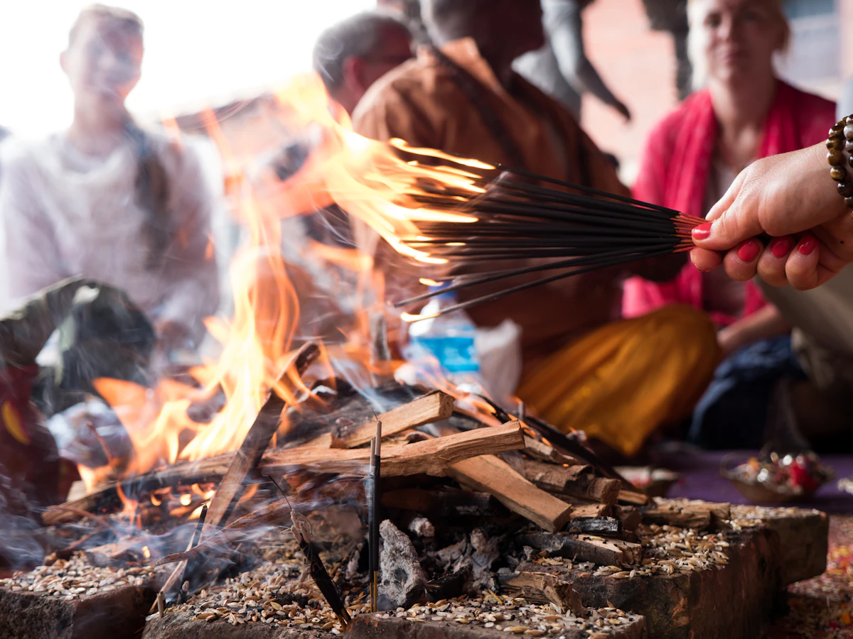 Devotees gathered around a sacred fire